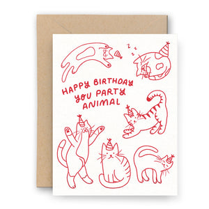 Letterpress greeting card with red outlines cats with party hats playing around the text "Happy Birthday You Party Animal".